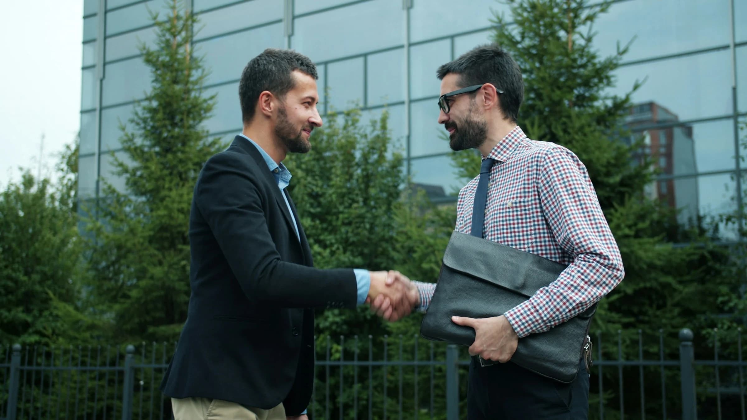 Business professionals shaking hands on a partnership