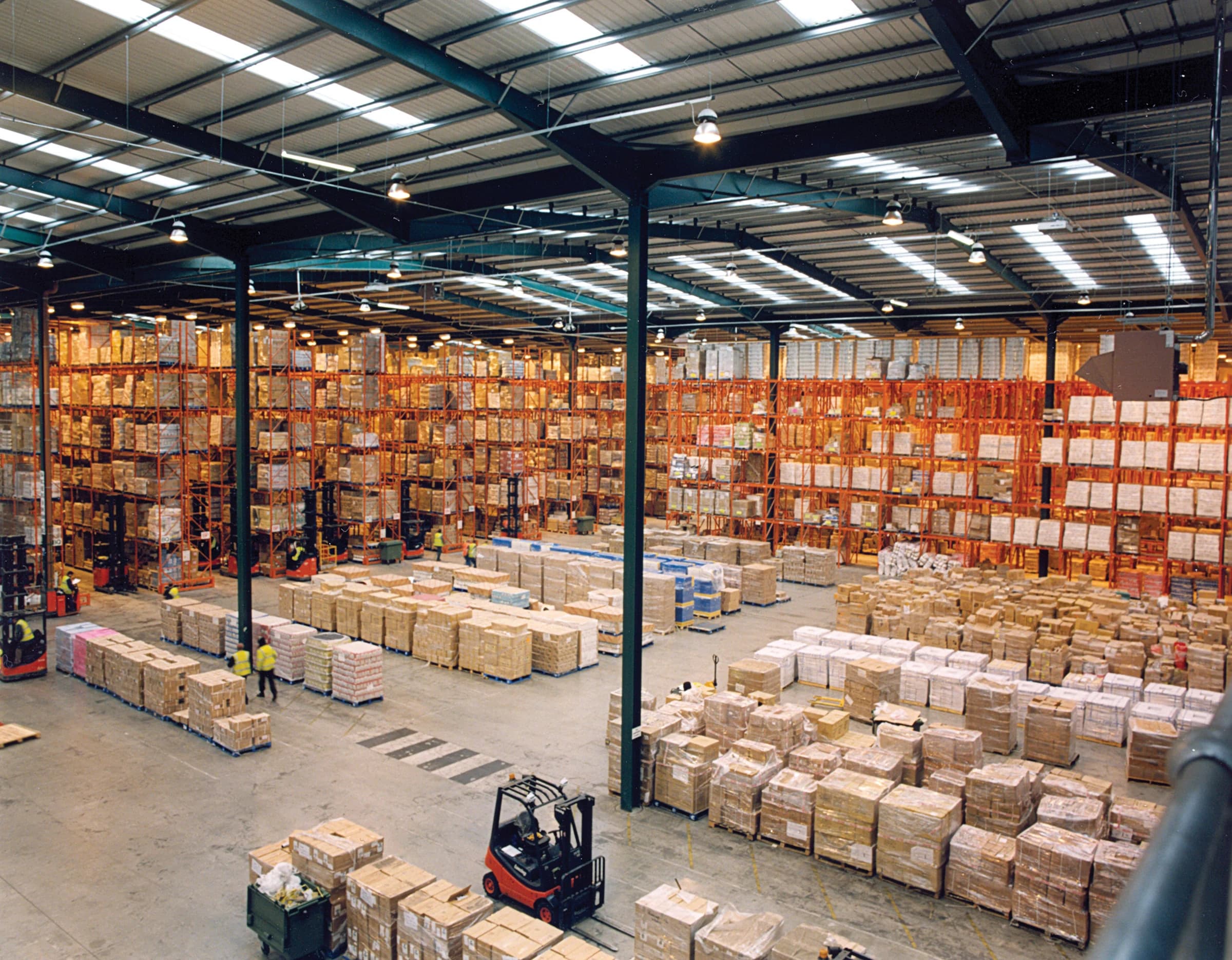 Wholesale warehouse with stocked shelves for distribution
